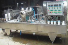 Máy chiết rót dán màng cốc tự động