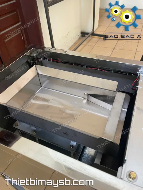 Bên trong máy định lượng